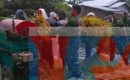 Babinsa dan PPL Dampingi Petani Panen Padi di Kecamatan Biru Biru