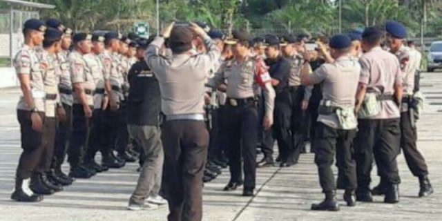 Terima Personil BKO Brimob Polri, Polres Deli Serdang Gelar Upacara di Bandara Kuala Namu