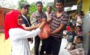 Kapolsek Medan Baru Berikan Bantuan Kepada Korban Banjir