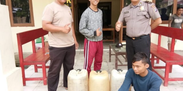 Polsek Lahusa Polres Nisel Sita 140 Liter Tuak Suling