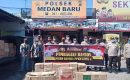 Polsek Medan Baru Bagikan Sembako dari Kapoldasu Kepada Warga Terdampak Covid 19