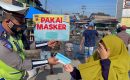 Sat Lantas Polres Tanjung Balai Bagikan Masker Kepada Pengendara