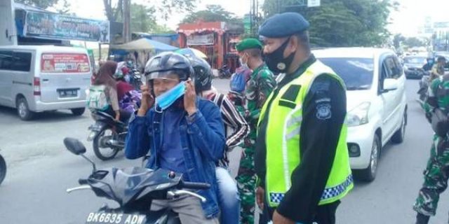 Brimob Poldasu Terus Sosialisasikan Prokes Kepada Masyarakat