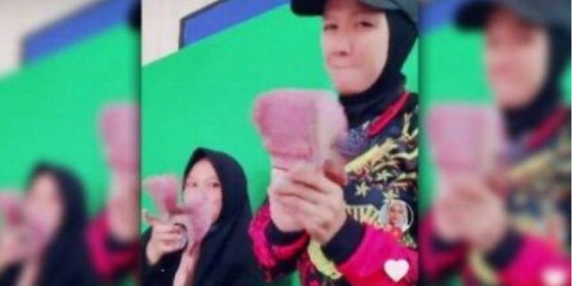Video Pamer Uang Segepok Sang Istri Viral, Kapolres Tebing Tinggi Dicopot